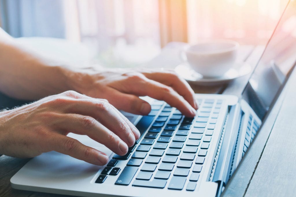 hands on computer keyboard